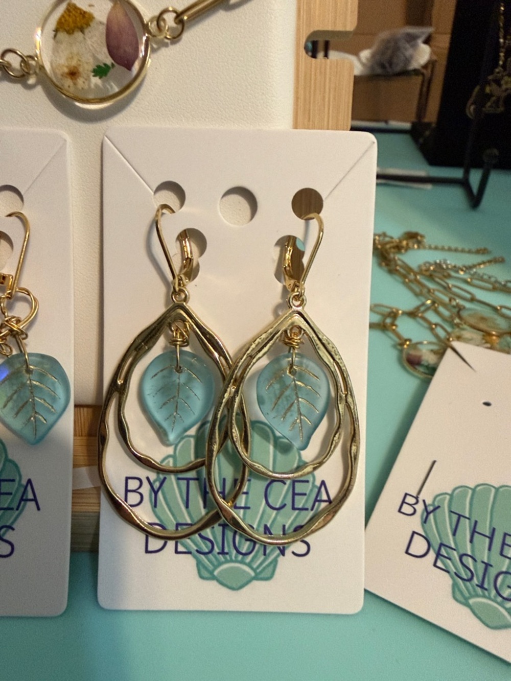 Gold Teardrop Earrings with Aqua Leaf Charm